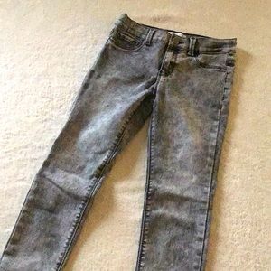 Super skinny jordache jeans gray and white very worn out never worn.